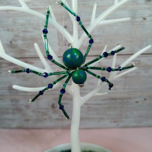 Green and blue polymer clay Christmas spider